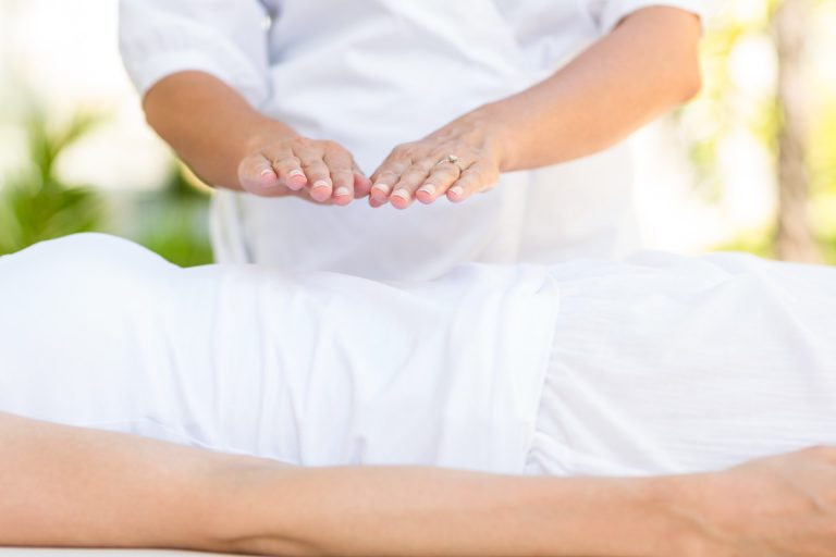 Reiki healing on table natural health