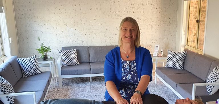 Diana Fels healing client on table natural health