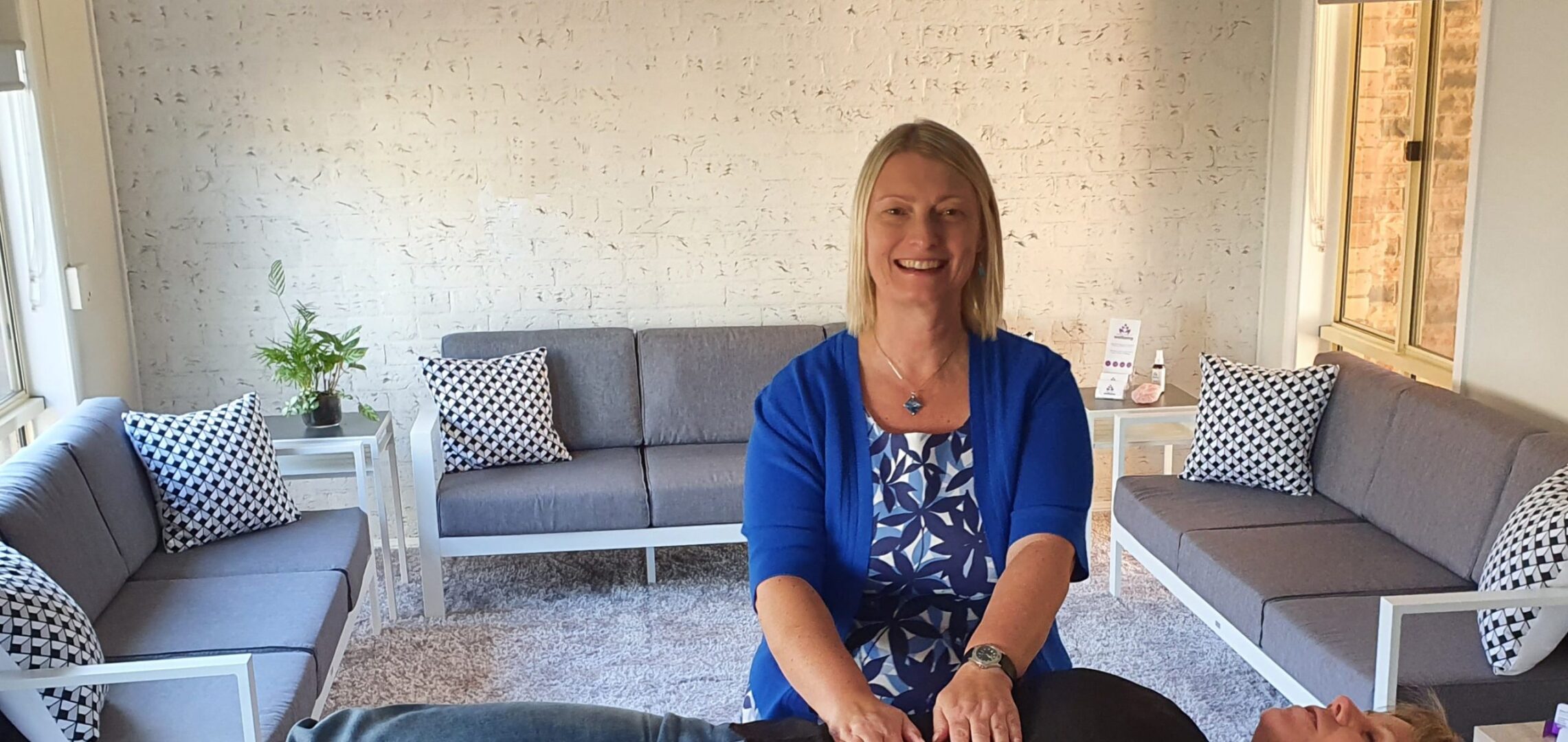 Diana Fels healing client on table natural health